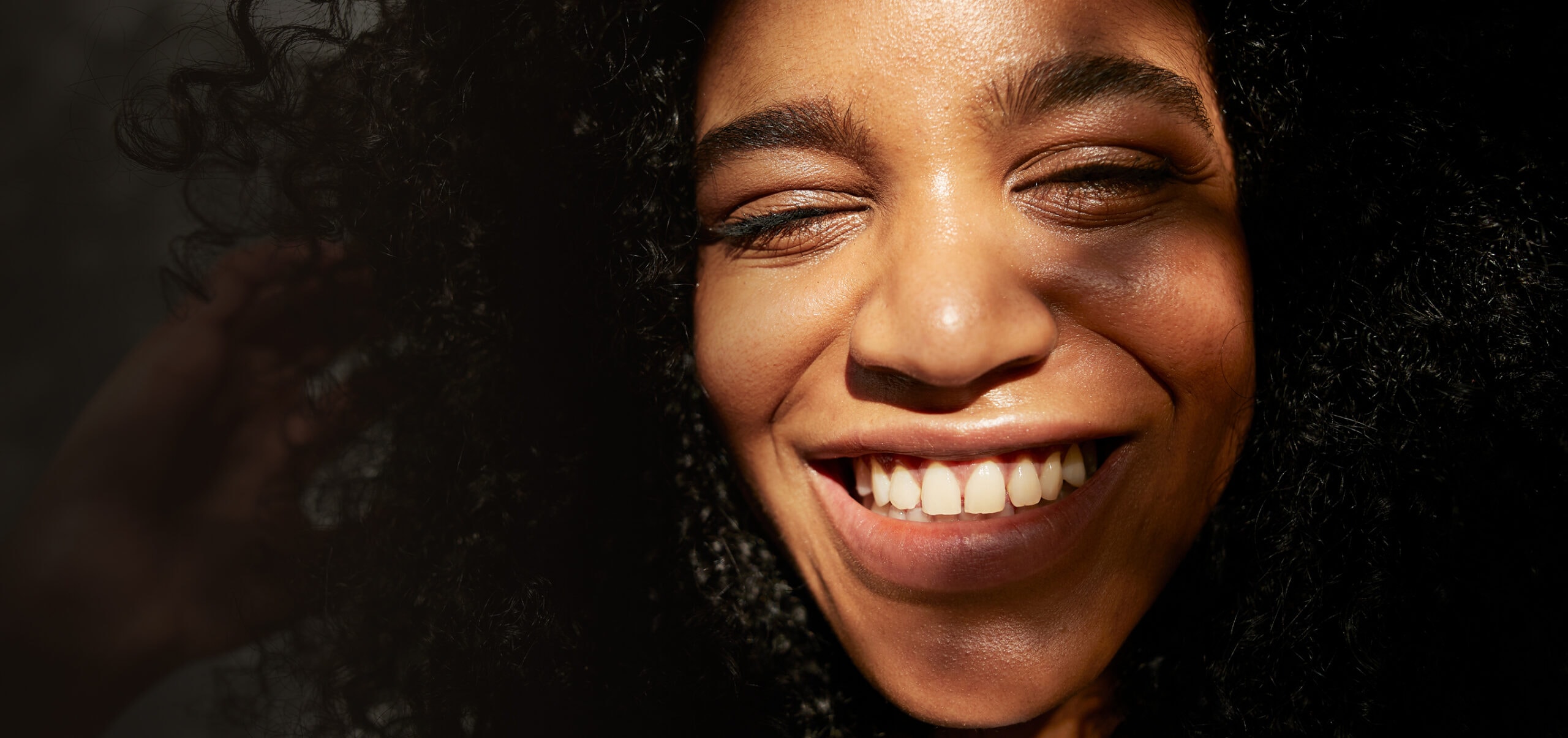 A woman smiling