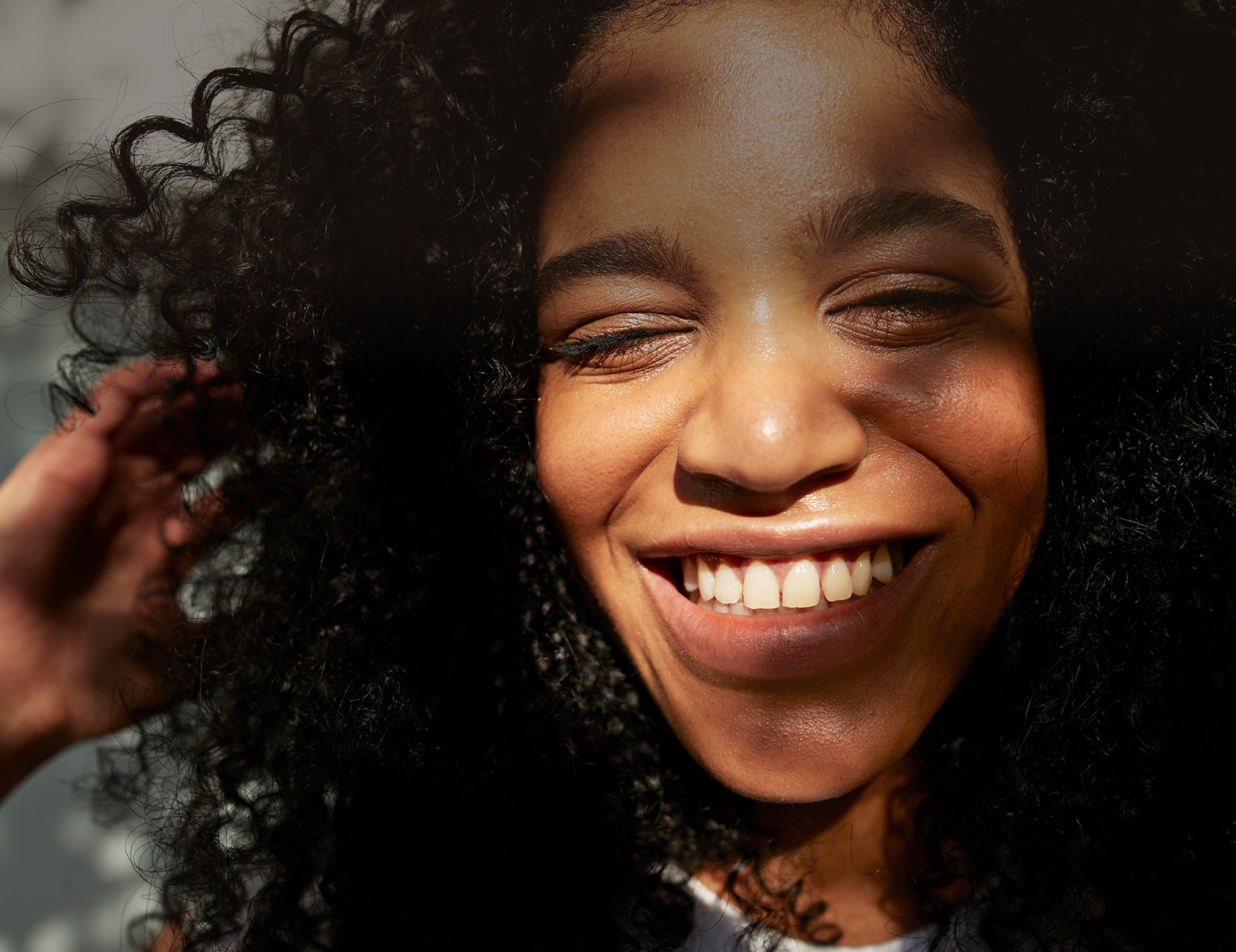 A woman smiling
