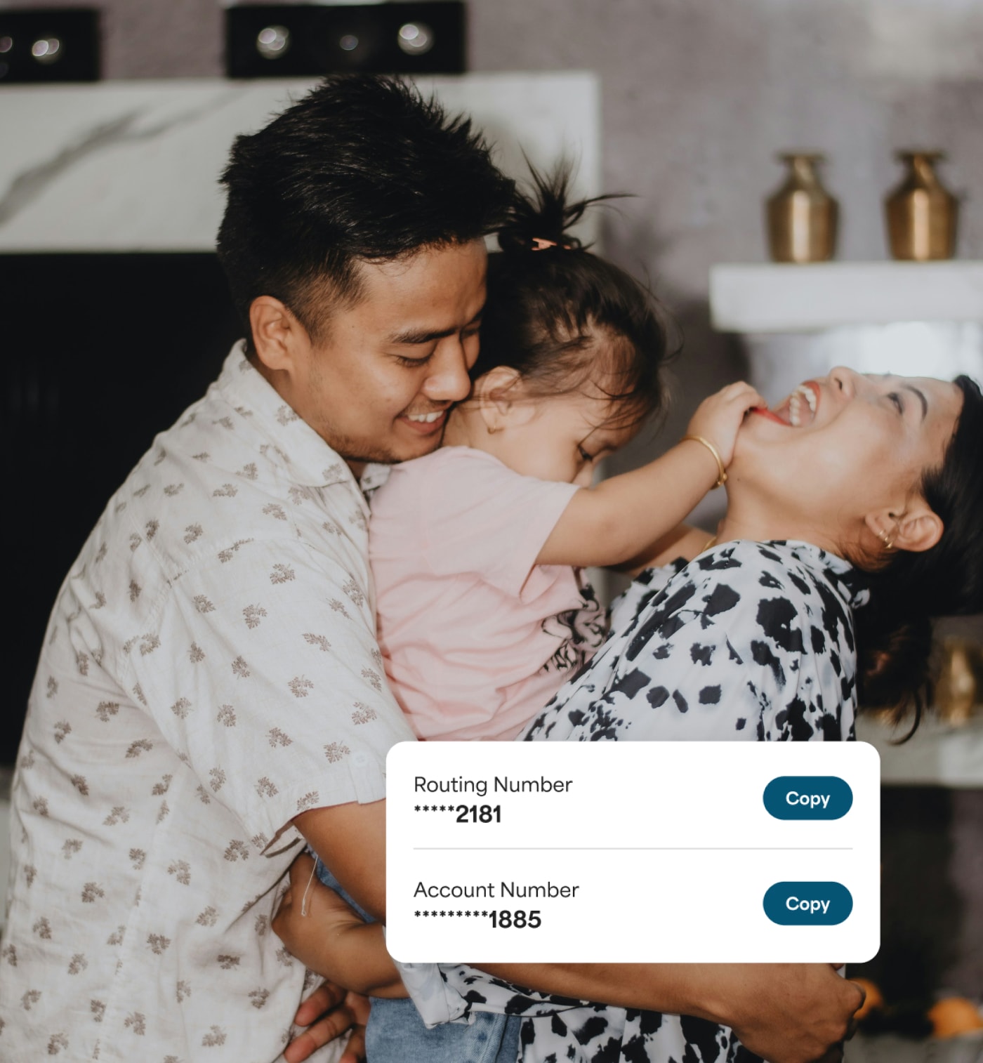 Happy family with an overlay showing direct deposit routing and account numbers