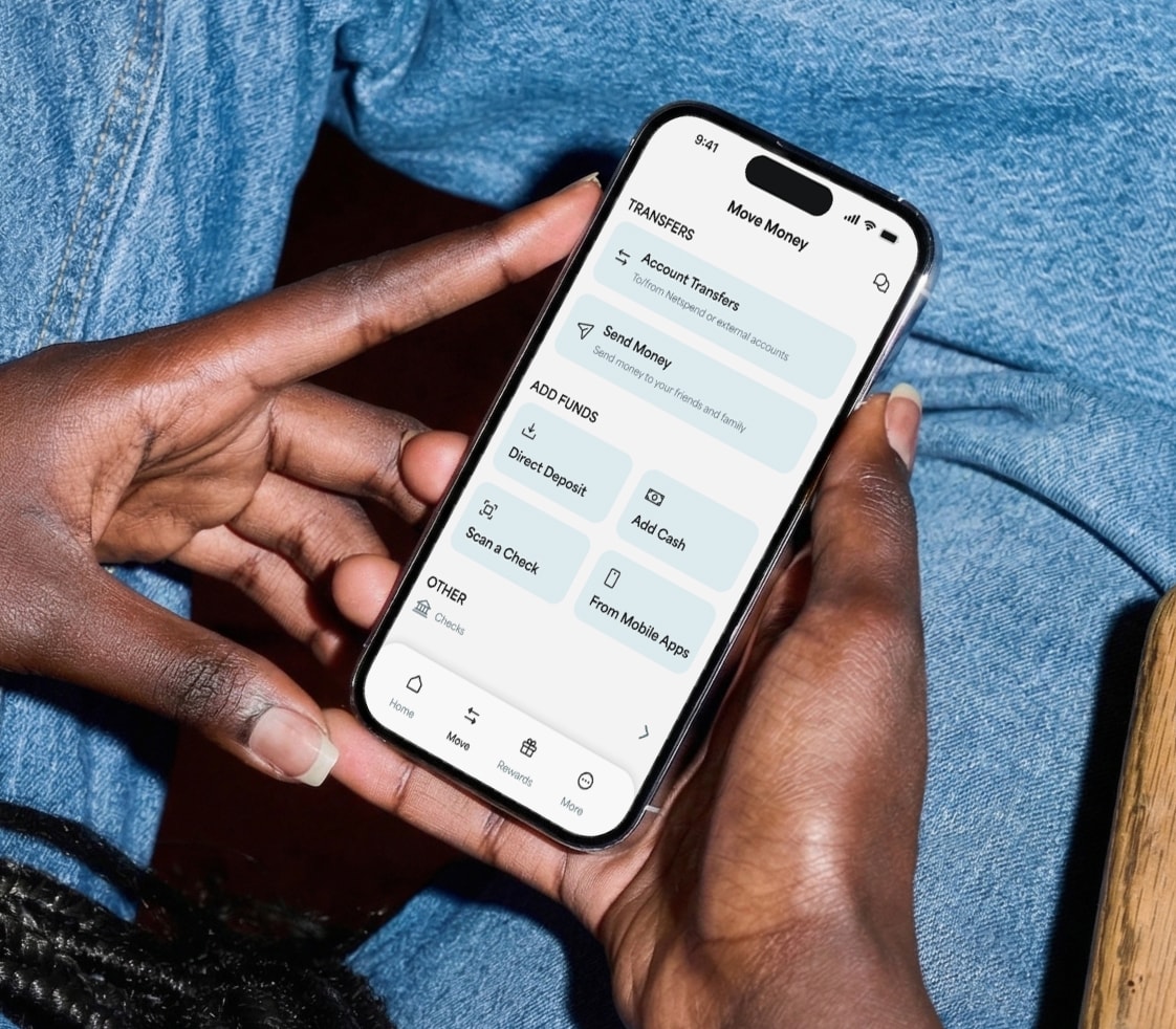 Someone holding their phone with the move money screen showing